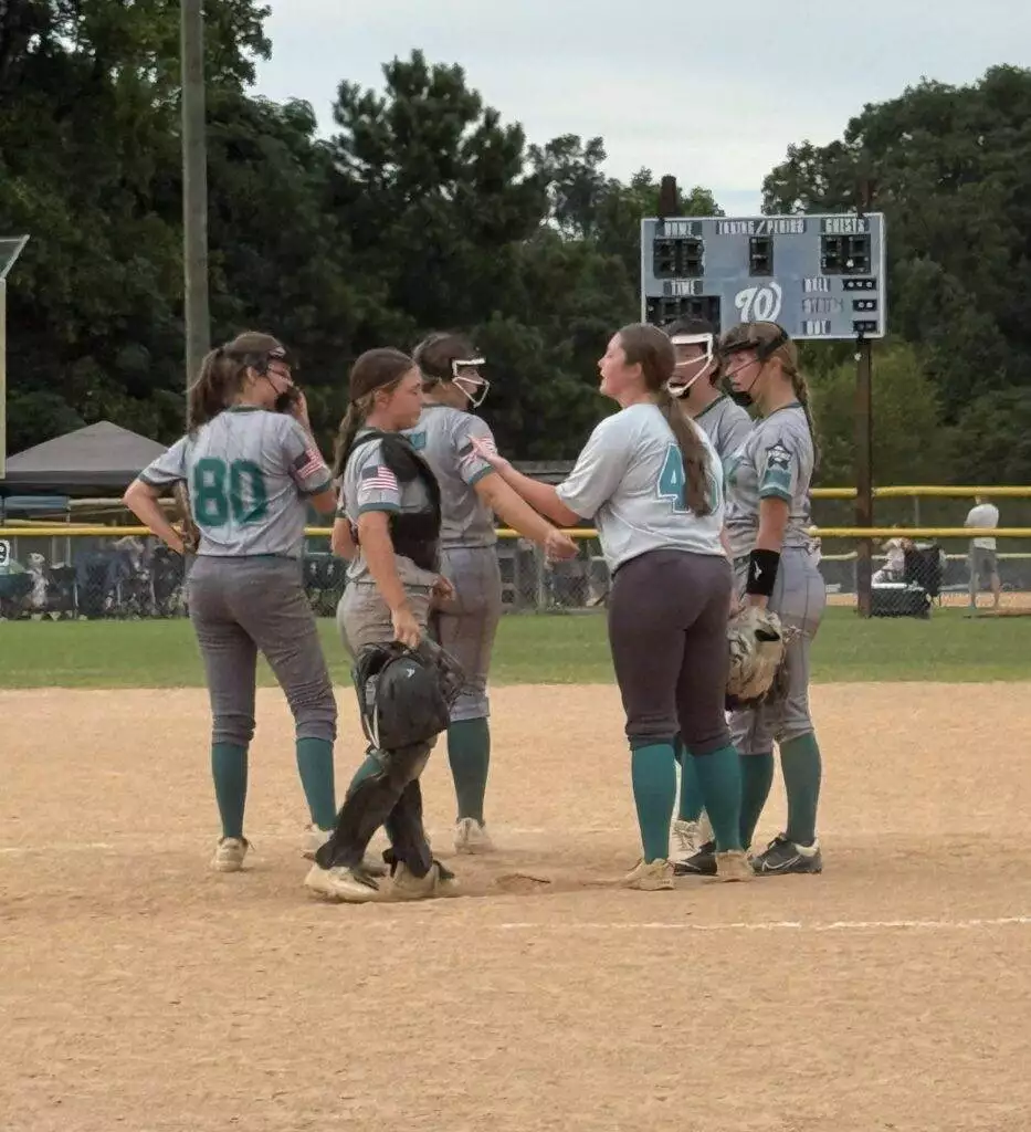 Infield huddle on August 23, 2025 in Clayton, NC.