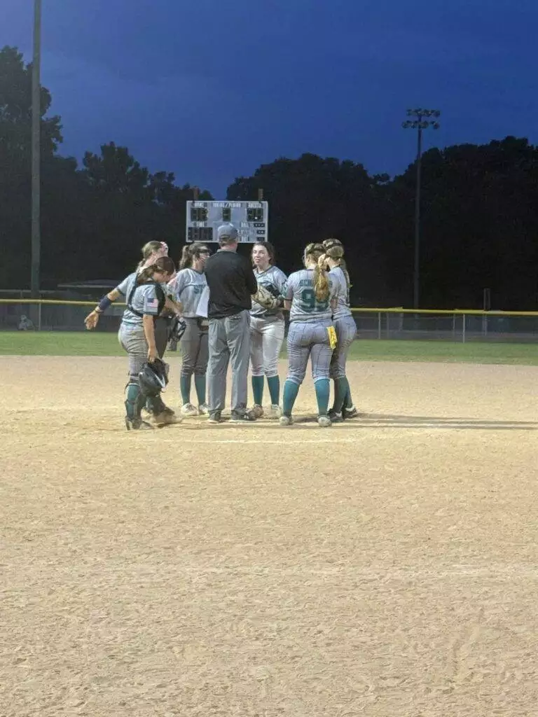 Infield huddle on August 23, 2025 in Clayton, NC.