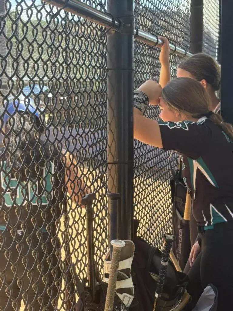 Breelyn in dugout at Tier One Edge Showcase tournament - August 9-10, 2025 in Raleigh, NC