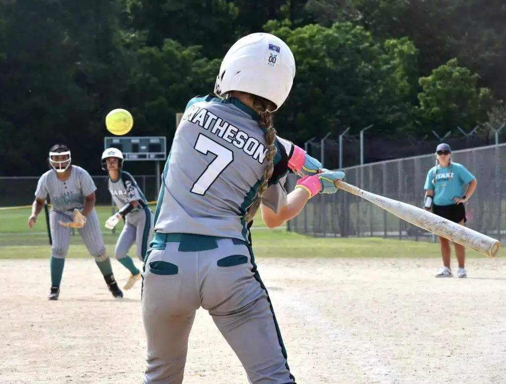 Brissa hitting and Emilia running in Laurinburg - May 24, 2025