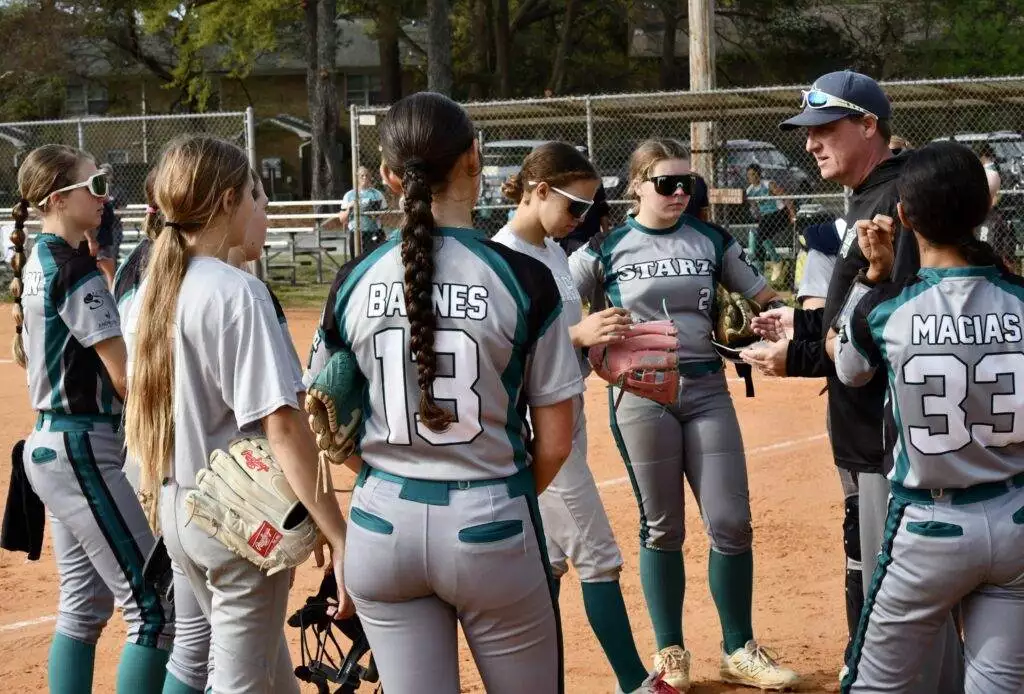 Coach Chris with team in Kinston on March 29, 2025