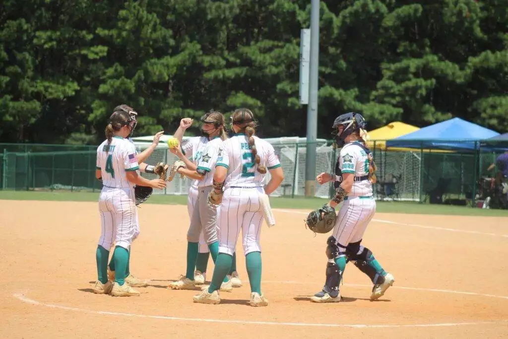 Infielders in the circle in Apex, NC on July 19, 2025