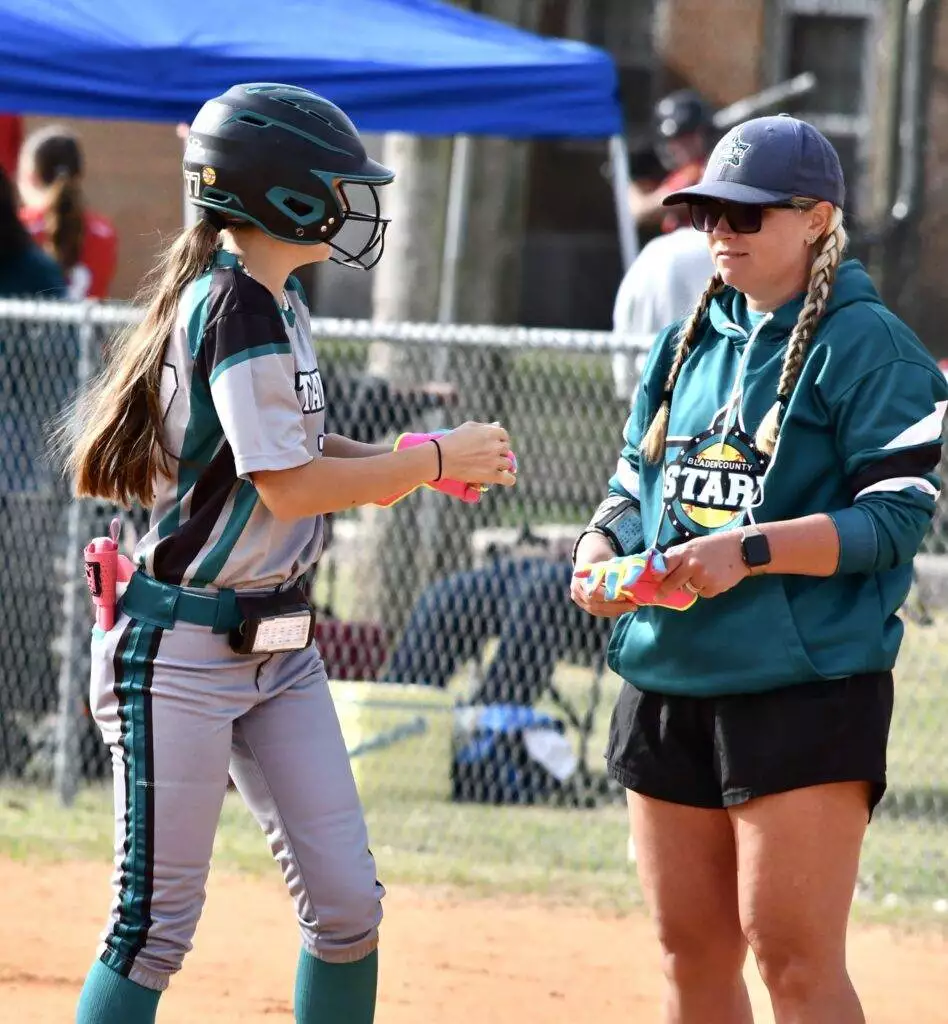 Payton and Coach Cara in Kinston on March 29, 2025