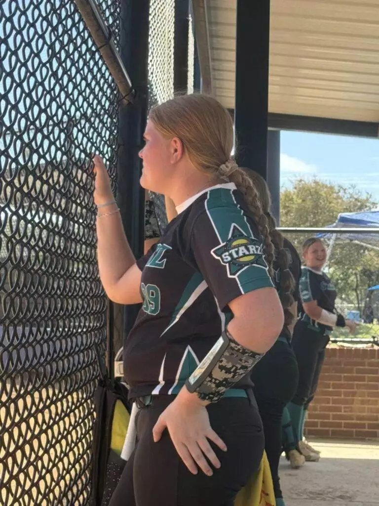 Serenity in dugout at Tier One Edge Showcase tournament - August 9-10, 2025 in Raleigh, NC